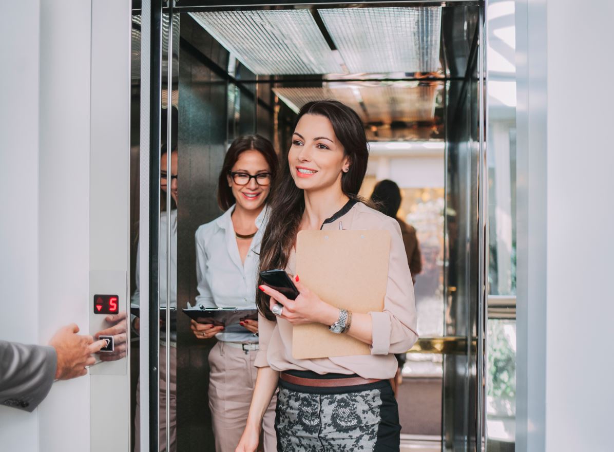 Persons coming out from elevator