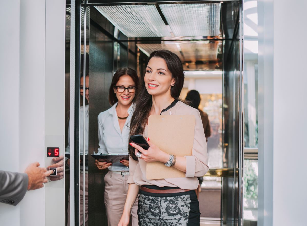 Persons coming out from elevator