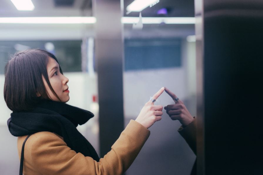 Women checking the Elevator