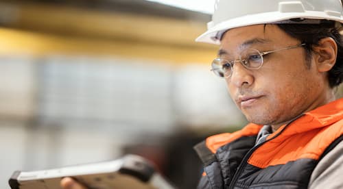 A man holding tablet