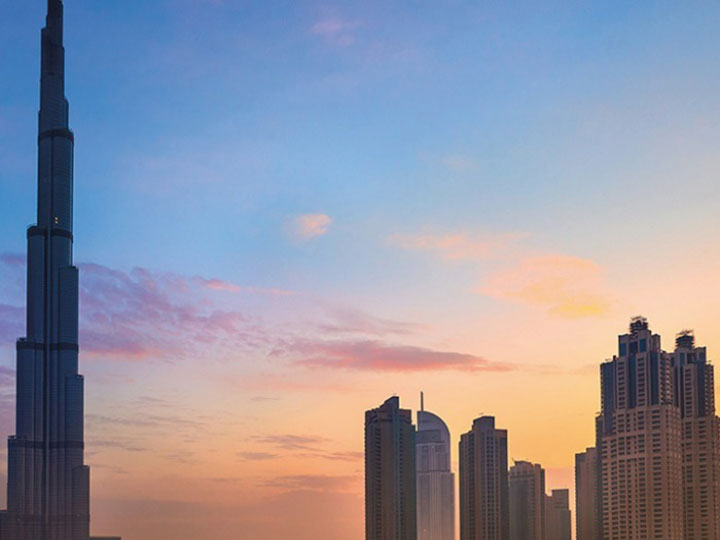 Skyscraper in a city view at sunset