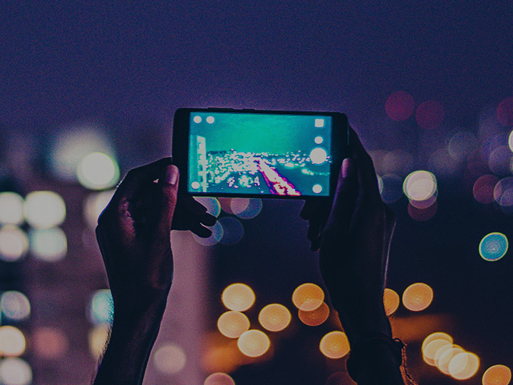 male hands holding a smart phone 