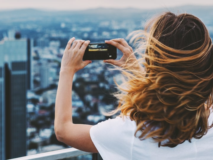 woman taking picture