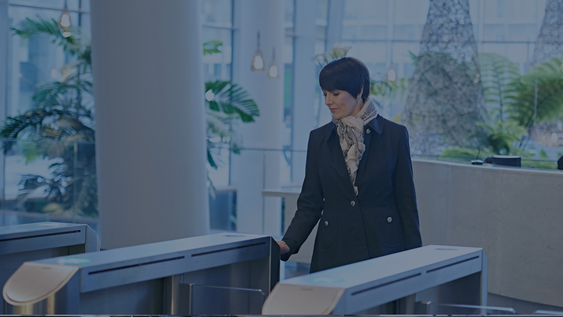 woman using card entering office workspace 