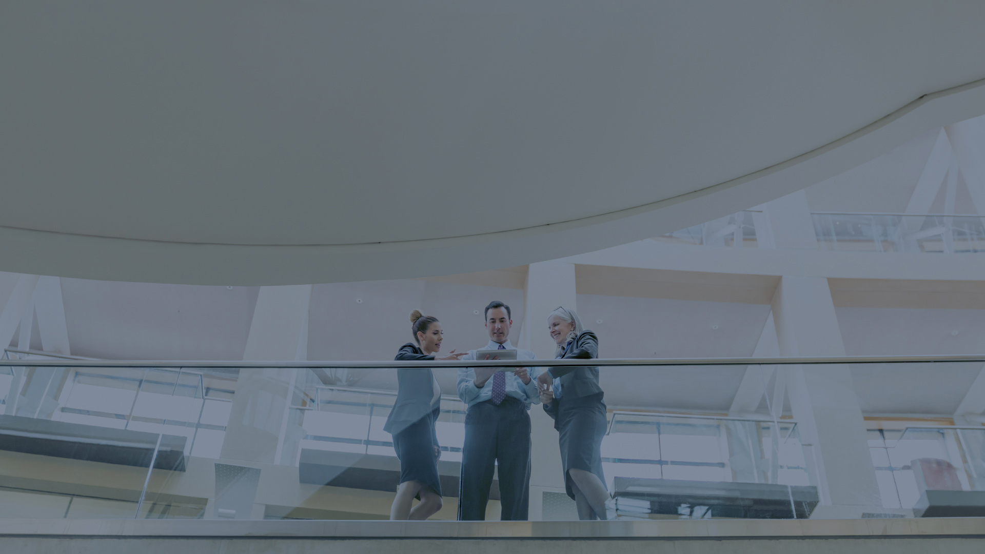 business-people-using-tablet-on-balcony