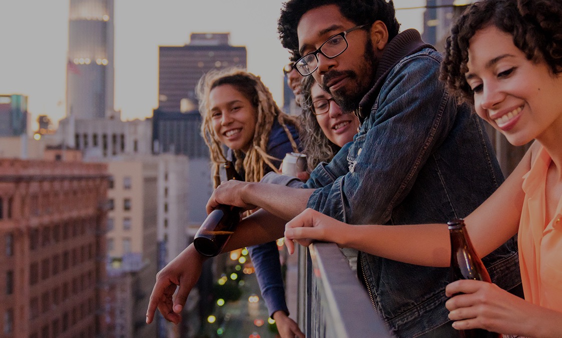 people-looking-over-balcony-1900x675