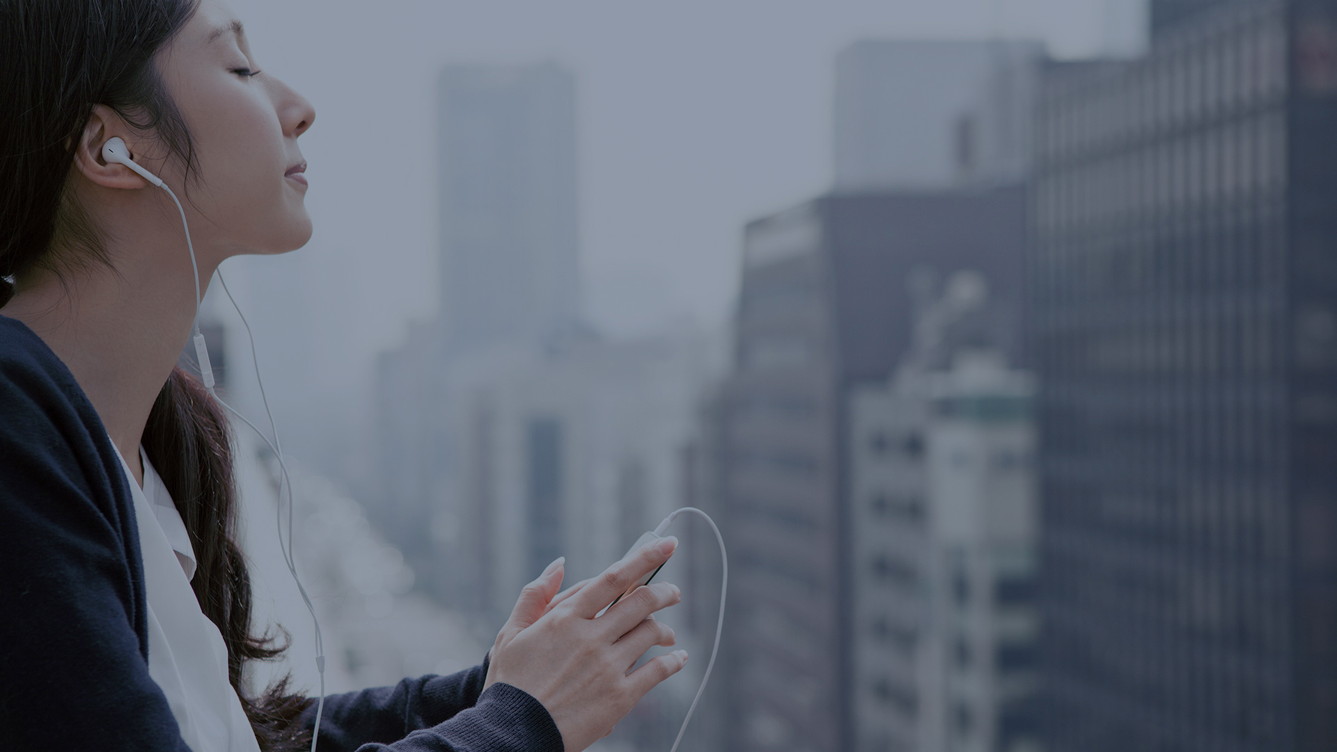 young woman with earphones