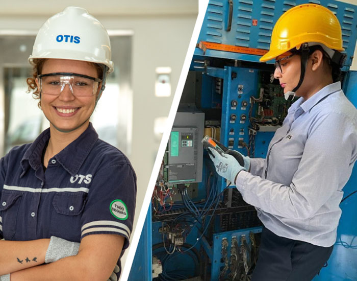 Two female Otis elevator mechanics