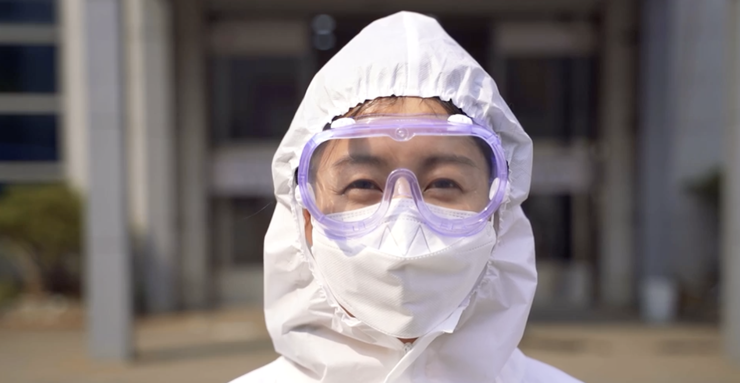 man wearing mask, eye glasses and cover all body suite 