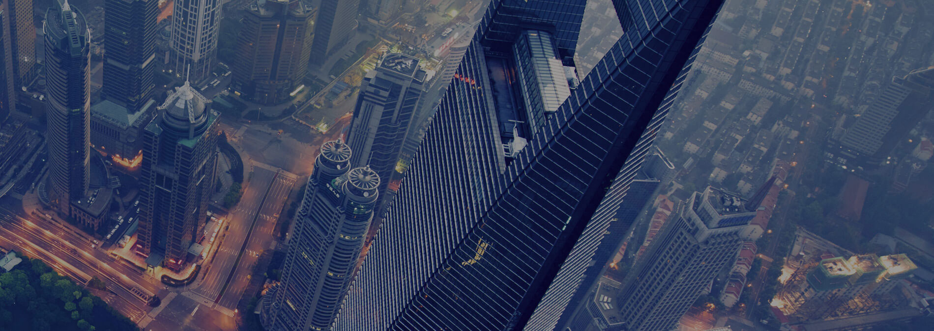 shanghai-world-financial-center-nightime-aerial-1900x675