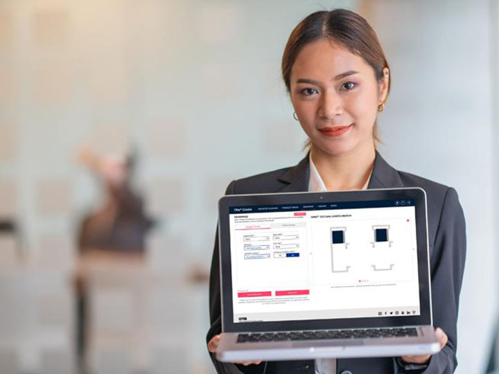 Woman holding computer show the computer screen