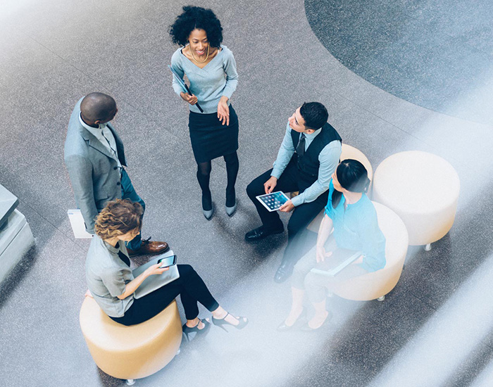 Group of people gathered in an office setting