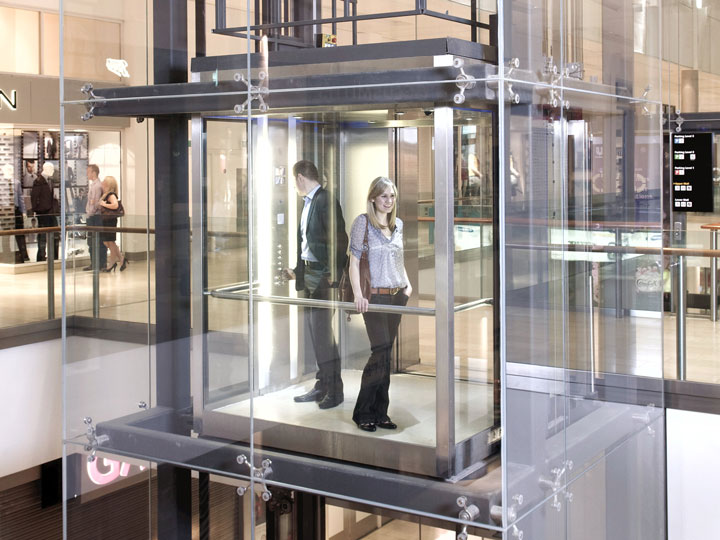 girl in glass elevator