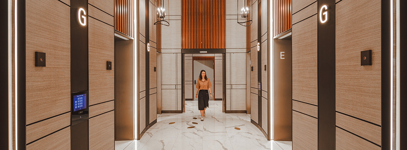 Person walking by elevators