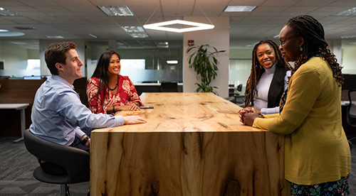 Colleagues talking in the office