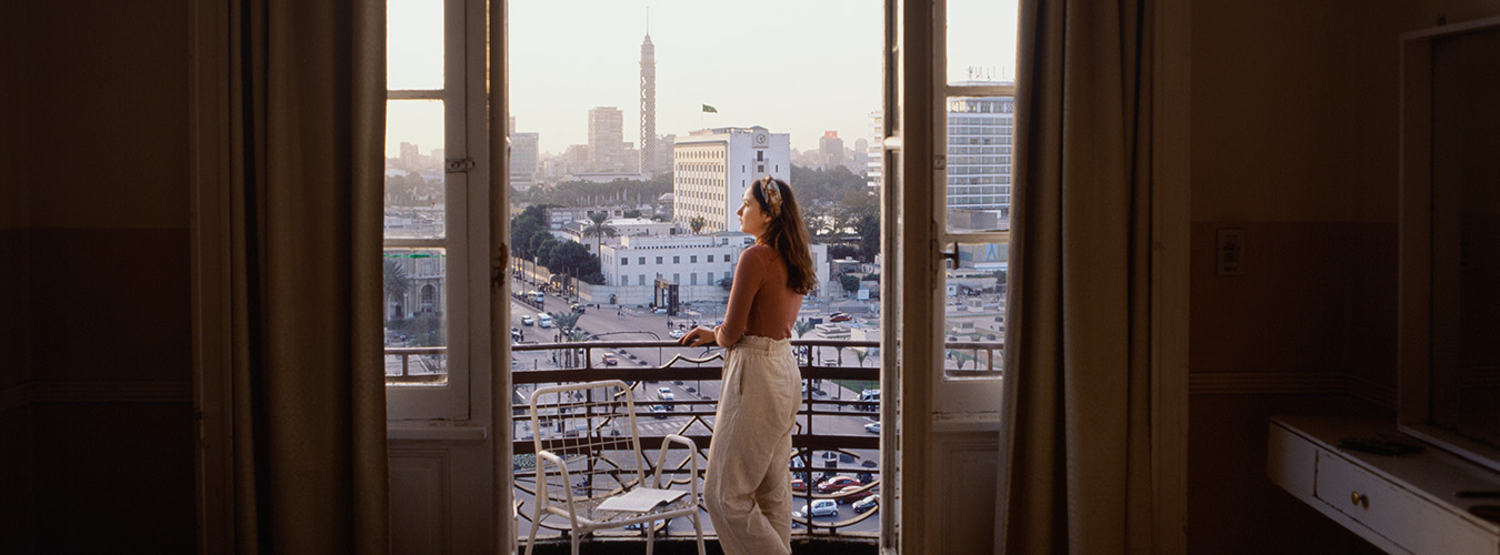 Woman standing on a balcony