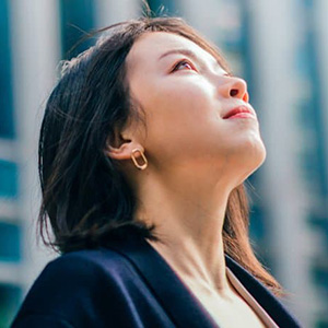 Woman looking up to the sky