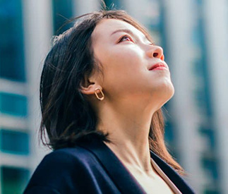 Woman looking to the sky