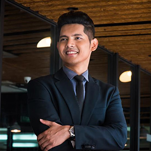 Man in a suit smiling