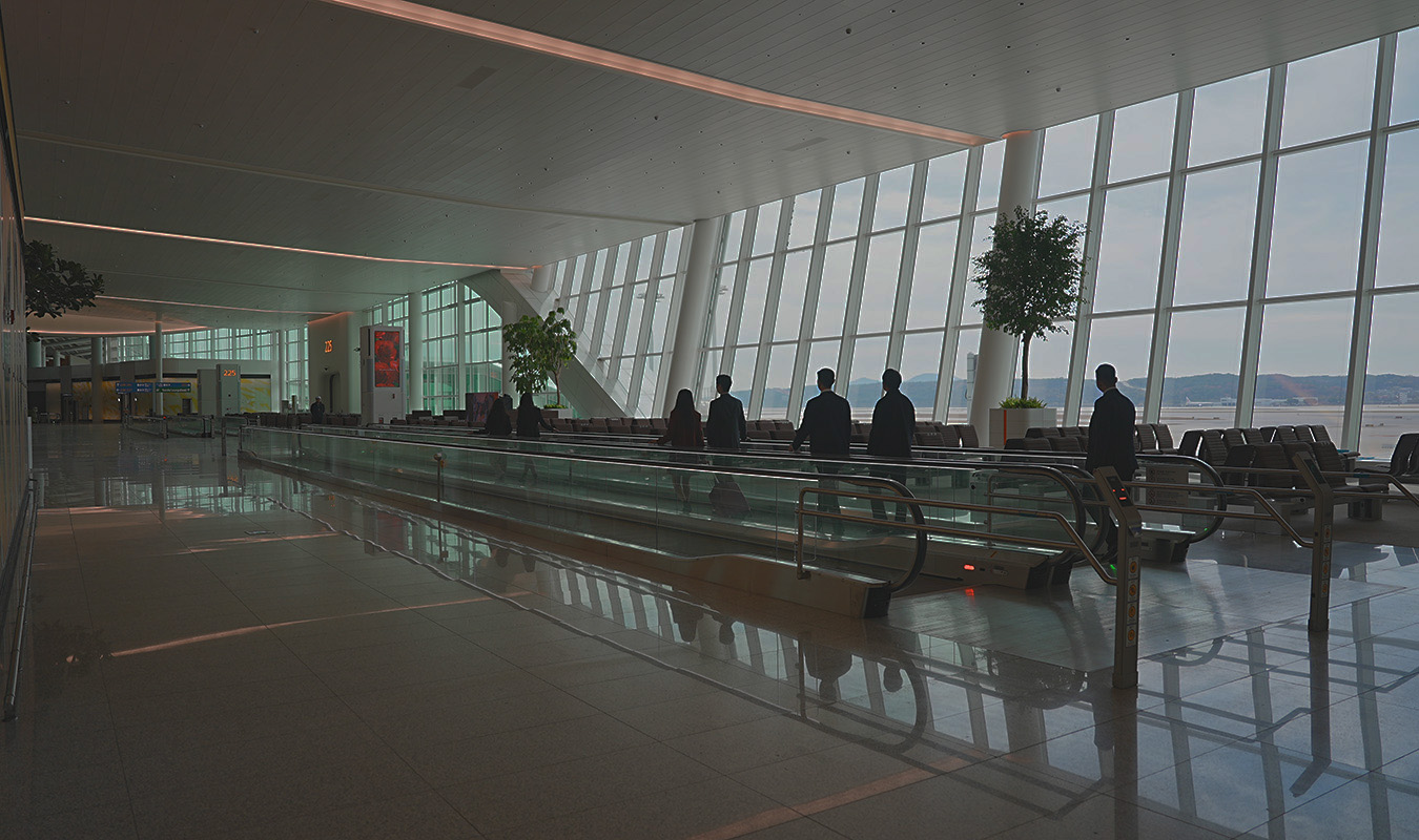 People traveling through Incheon International Airport