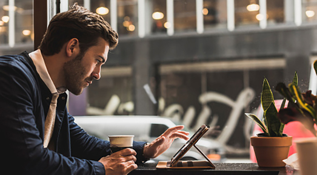 man working on tablet