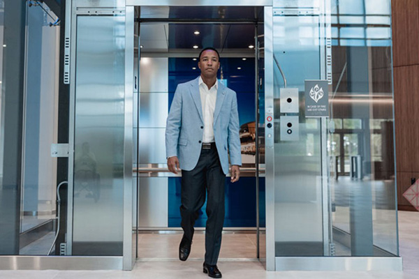 Man walking out of elevator