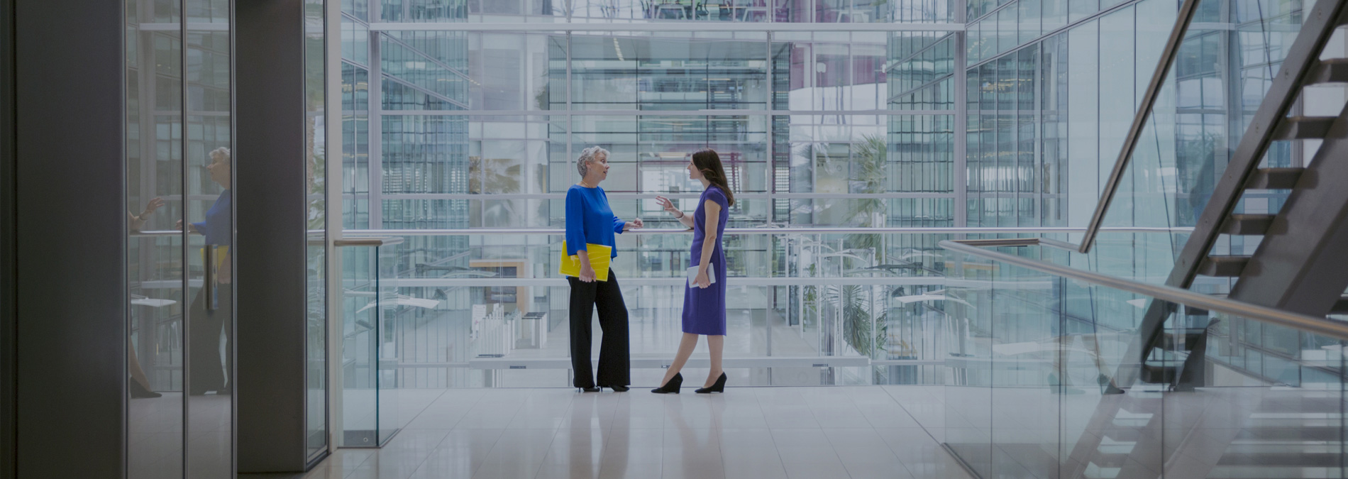 two women talking on the corridor 