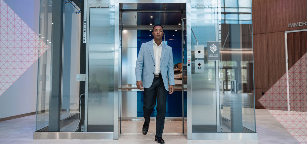 Man working out from elevator